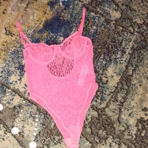 Pink body suit